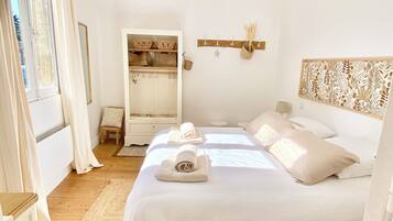 2 dormitorios, tabla de planchar con plancha, wifi y ropa de cama