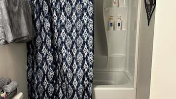 Hair dryer, towels, soap, toilet paper
