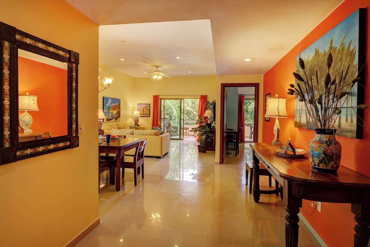 Căn hộ Tiêu chuẩn, ban công, quang cảnh hồ bơi (Palmar Vista Jardin #202) | Khu phòng khách