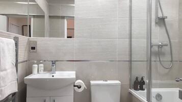 Hair dryer, towels, soap, toilet paper