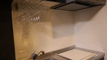 Fridge, microwave, cookware/dishes/utensils