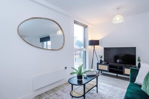 TV, offices - Stylish duplex 2-bed with balcony & parking (Manchester)
