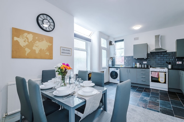 Dining Room: Enjoy meals in style with a sunlit space perfect for gatherings and good times!