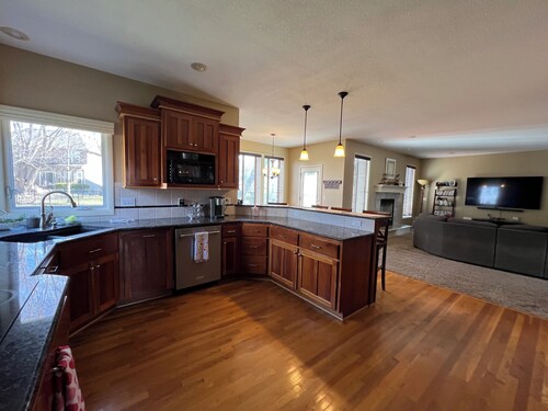 Spacious 5-bedroom house in Olathe. Finished basement and outdoor deck/space.