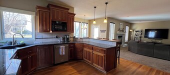 Spacious 5-bedroom house in Olathe. Finished basement and outdoor deck/space.