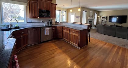 Spacious 5-bedroom house in Olathe. Finished basement and outdoor deck/space.