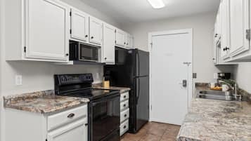 Huis, meerdere bedden, keuken, uitzicht op tuin | Privékeuken