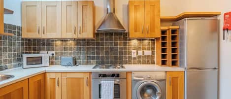 Coffee/tea maker, fridge, microwave, oven