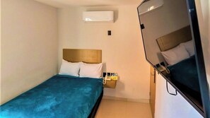 1 quarto, Wi-Fi de cortesia, roupa de cama