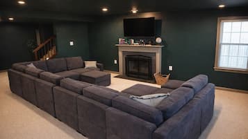 Smart TV, fireplace, books