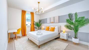 2 bedrooms, desk, iron/ironing board, travel crib