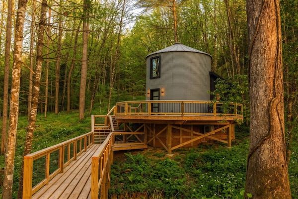 Welcome to The Yoder by The Hideaways. Step onto your private wrap-around deck and breathe in the crisp forest air. Whether it’s morning coffee or stargazing, this converted silo is your front-row seat to nature.