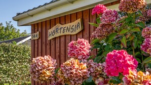 A wooden building with a sign reading "Hortensia 144". - Stunning home in Sydals with WiFi (Sydals)