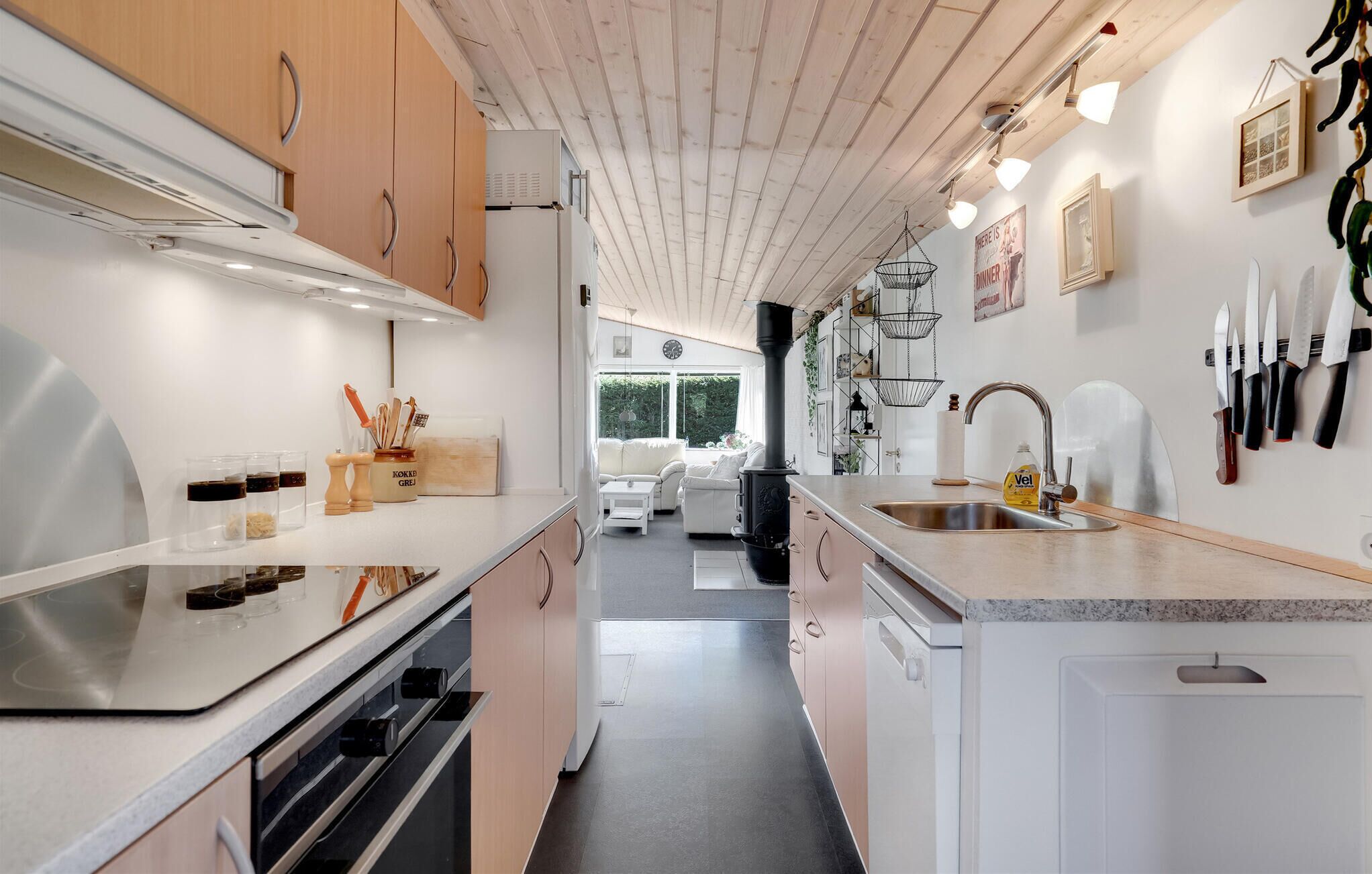 Fridge, stovetop, dishwasher, coffee/tea maker