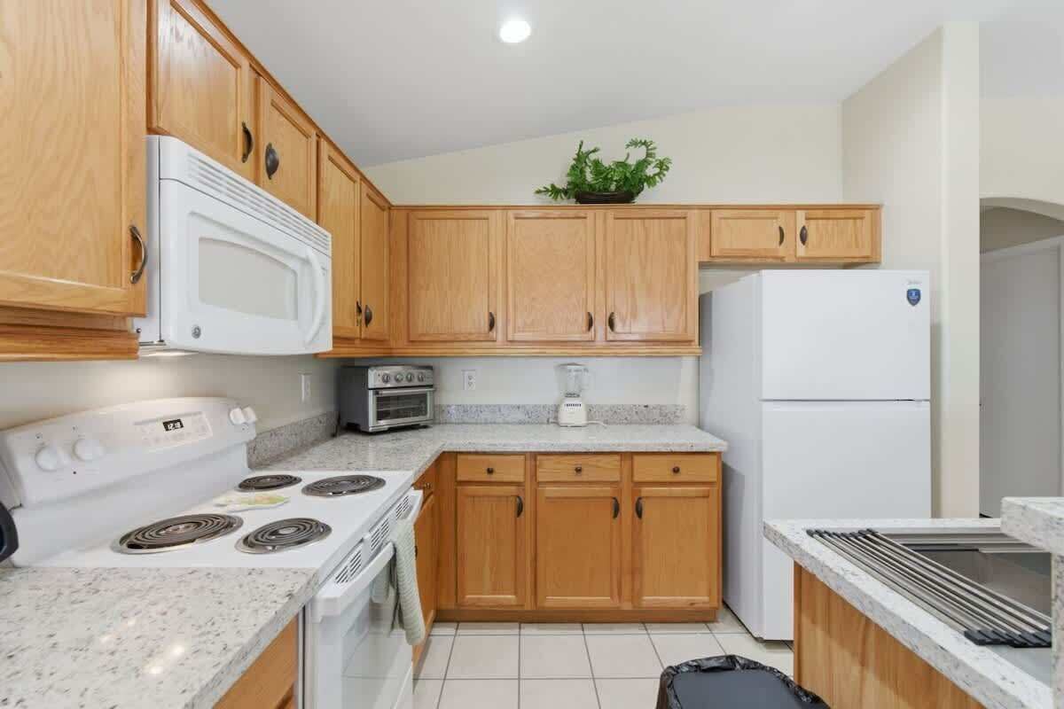 Fridge, stovetop, cookware/dishes/utensils