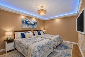 4 bedrooms, desk, iron/ironing board, travel cot