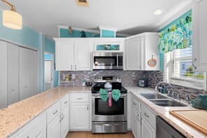 Fridge, microwave, stovetop, dishwasher - Open Water Views |  32' Boat, King Beds, Fish Cleaning Station, Waterfront Escape (Cudjoe Key)