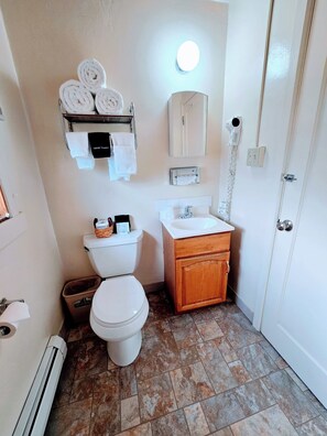 Hair dryer, towels, soap, toilet paper