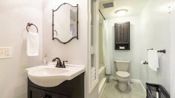 Hair dryer, towels, soap, toilet paper