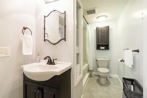 Hair dryer, towels, soap, toilet paper