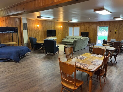 1-bedroom family get away house with huge open living area, and six beds.