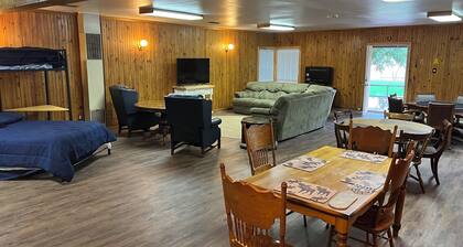 1-bedroom family get away house with huge open living area, and six beds.