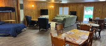 1-bedroom family get away house with huge open living area, and six beds.