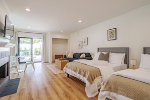 1 bedroom, desk, iron/ironing board, travel crib