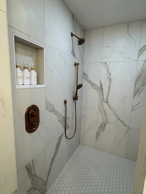 Shower, hair dryer, towels, soap