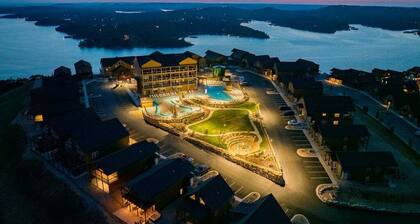 Lake Views • Hot Tub • Games • Fire Pit • Free Family Tickets • Golf Discounts!