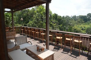 Deluxe Villa, Garden View | Outdoor dining - Luxury Riverside Cabins at Nunu Bali  (Tabanan)