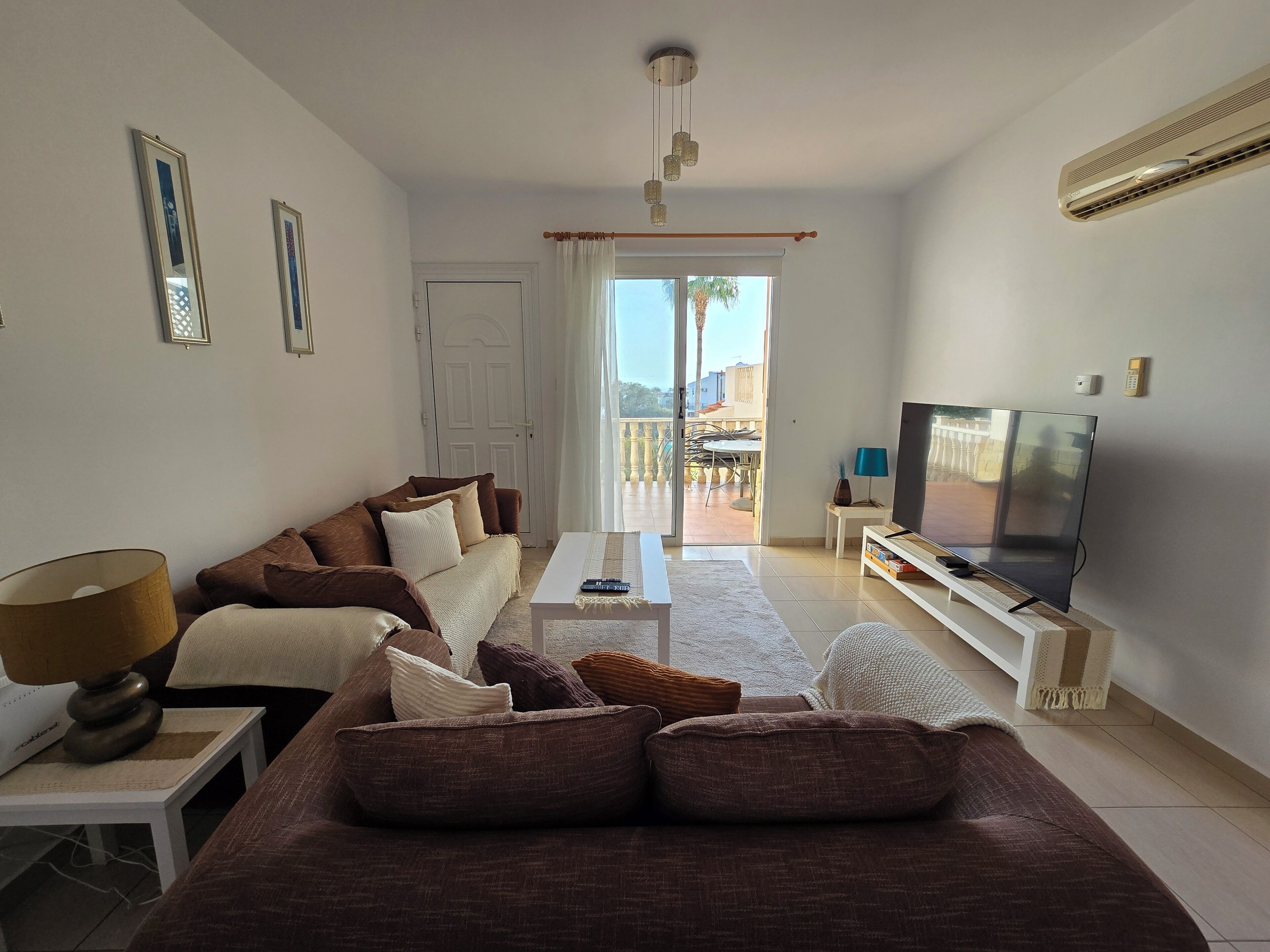 Casa de ciudad, vista al mar | Área de sala de estar