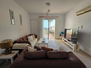 Maison en rangée, vue sur la mer | Aire de séjour