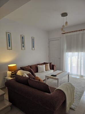 Maison en rangée, vue sur la mer | Aire de séjour