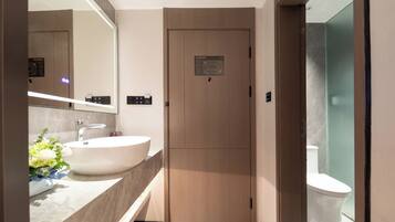 Basic Single Room, City View | Bathroom | Shower, free toiletries, hair dryer, slippers