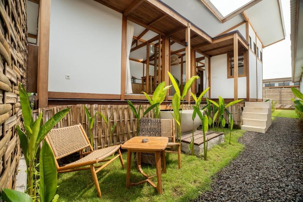 Villa Confort, vistas al jardín | Restaurante al aire libre