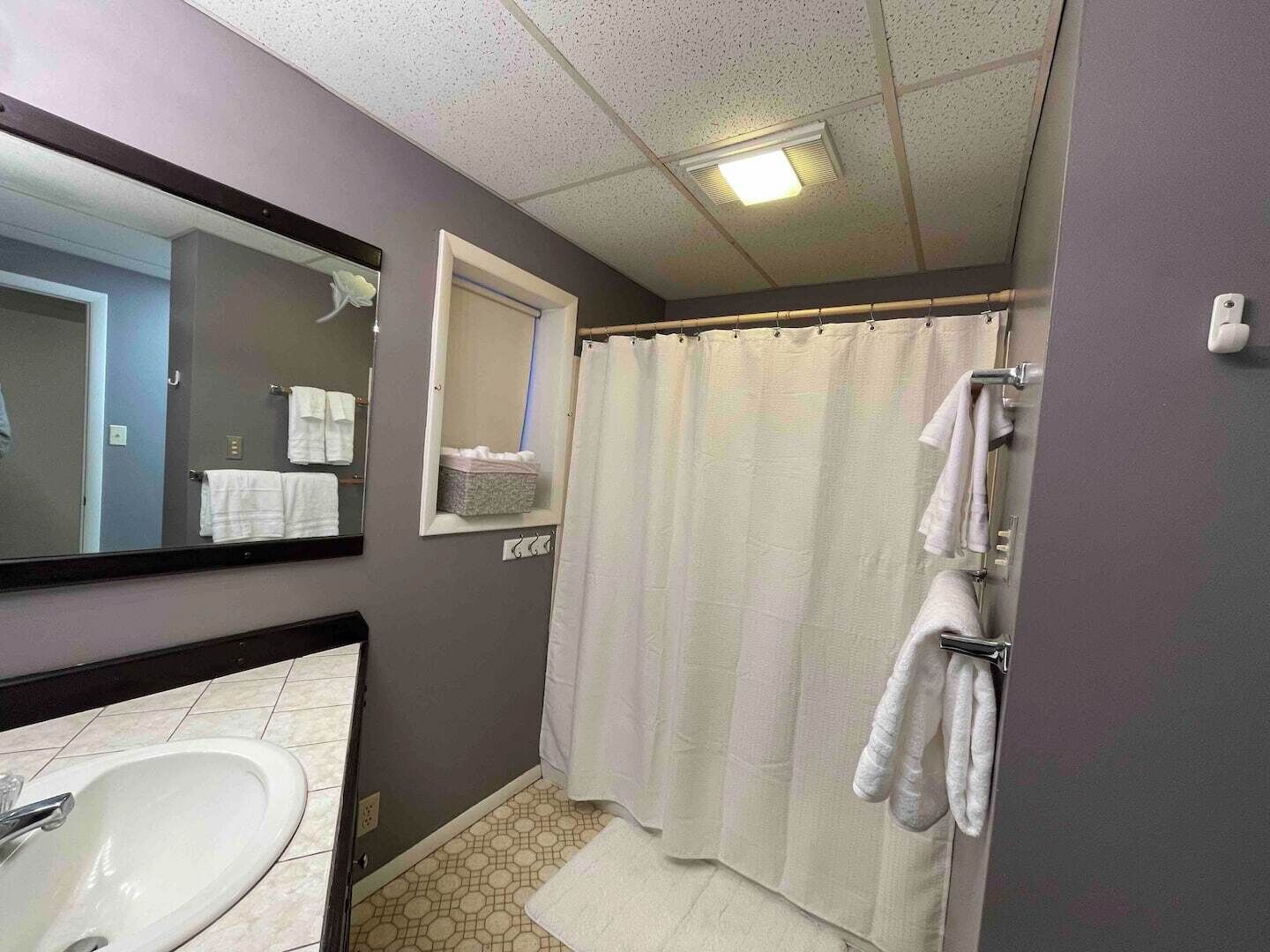 Hair dryer, towels, soap, toilet paper