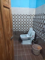 Ducha, artículos de tocador gratuitos, toallas, jabón