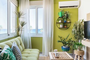 Living area - Whispering Palms 1-BR Apt. By Finikoudes Beach (Larnaca)