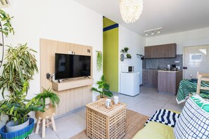 Comfort Apartment, 1 Double Bed with Sofa bed, Kitchenette, Sea View | Living area - Whispering Palms 1-BR Apt. By Finikoudes Beach (Larnaca)