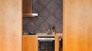 Studio Suite có thiết kế đặc sắc, quang cảnh resort | Bếp riêng