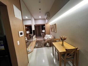 Living area - Modern 1-Bedroom Unit in BGC – Comfortable & Fully Equipped (Taguig)