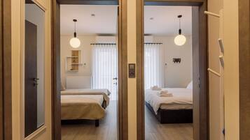 2 bedrooms, desk, iron/ironing board, travel crib