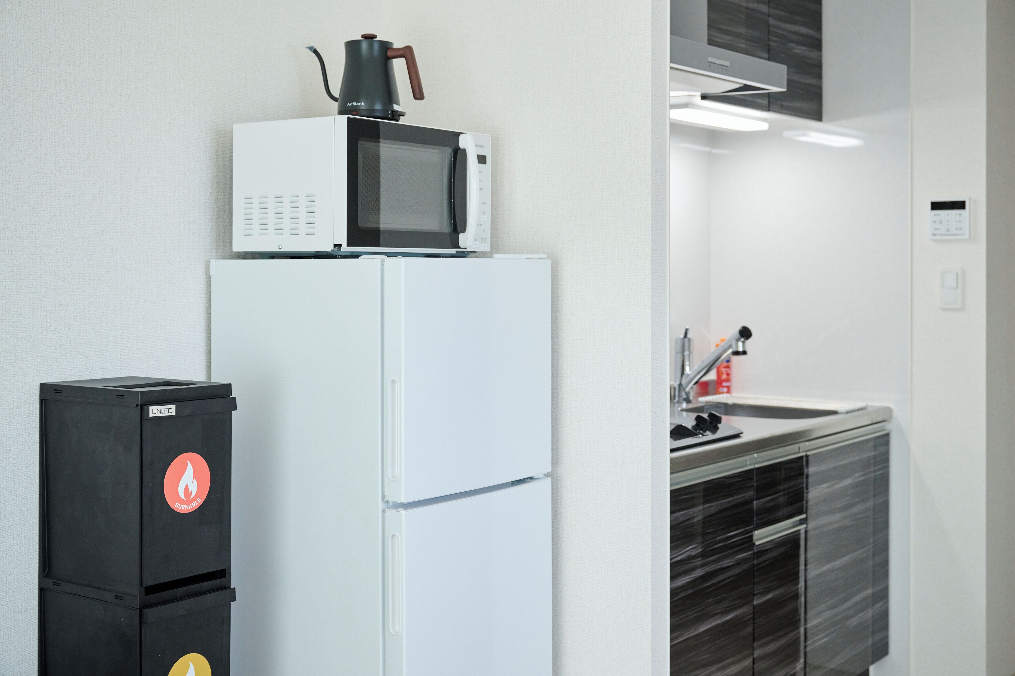 Fridge, microwave, stovetop, cookware/dishes/utensils