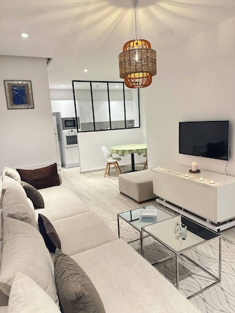 Apartment, 1 Bedroom, Smoking | Living room | Books. Charming 1-bedroom Apartment in Marsa, Tunisia