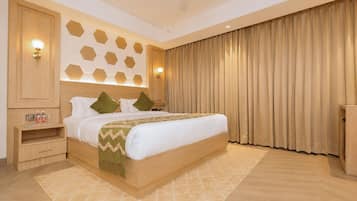 Premium Room | In-room safe, desk, laptop workspace, blackout drapes