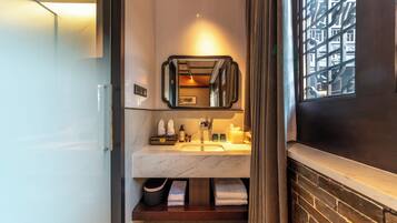Deluxe Double or Twin Room | Bathroom | Hair dryer, slippers, towels, soap