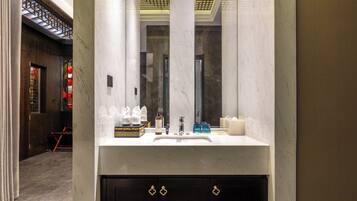 Luxury Double Room, Courtyard View | Bathroom | Hair dryer, slippers, towels, soap