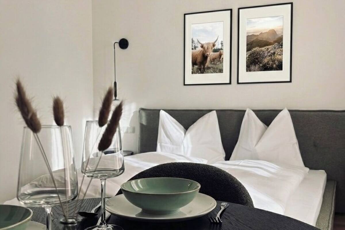 Premium bedding, laptop workspace, cribs (surcharge), WiFi (free)
