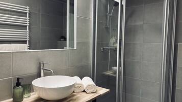 Shower, free toiletries, hair dryer, towels